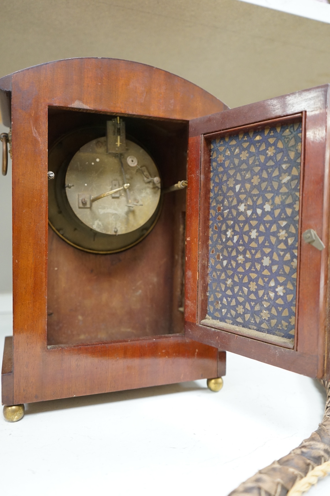 A 19th century brass inlaid mahogany mantel clock, 35cm high